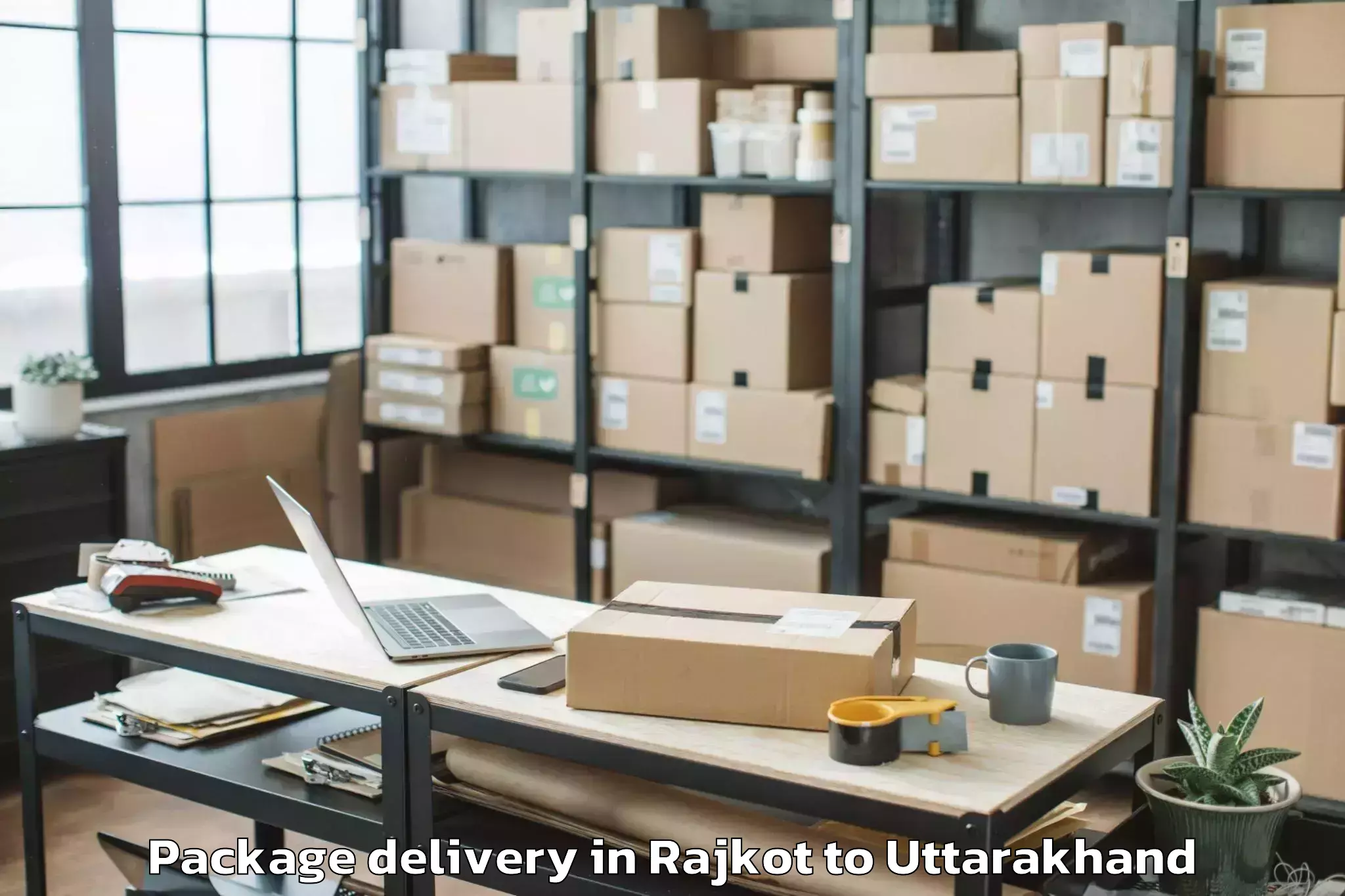 Book Rajkot to Thalisain Package Delivery Online